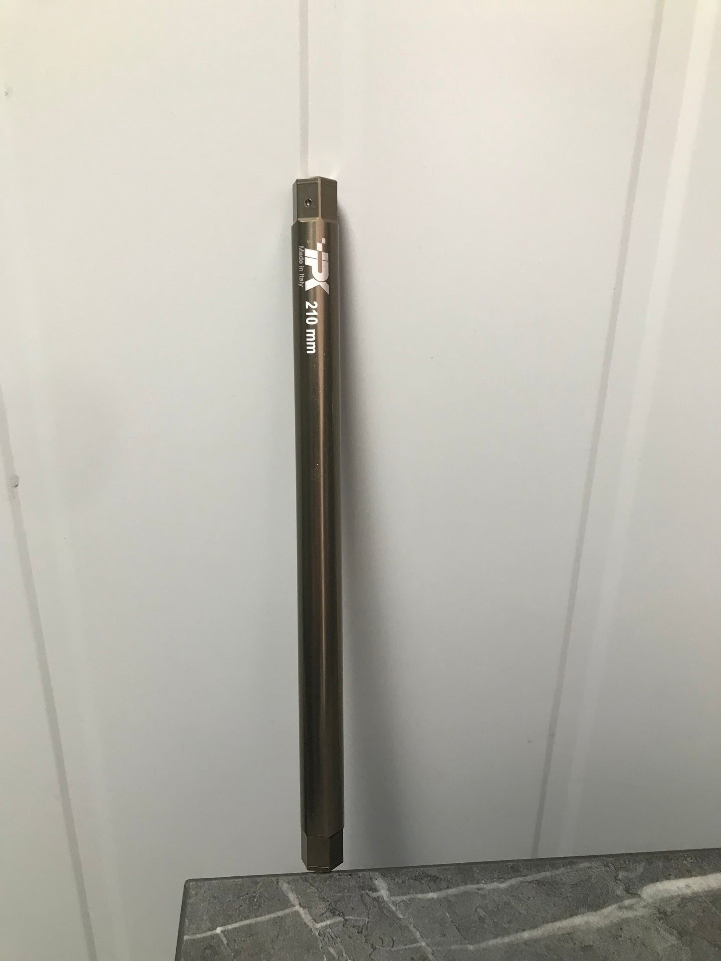 Tie rod L.210mm anodized titan gold.